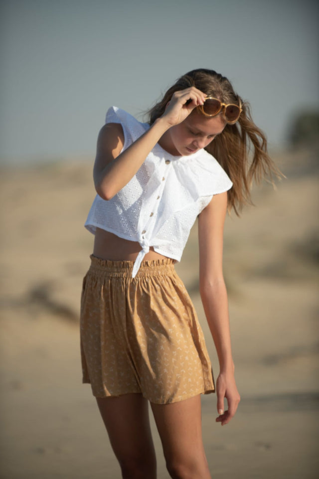 Coral Girl’s Top with your favorite shorts, skirt, or pants.